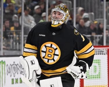 Boston Bruins goaltender Jeremy Swayman (1) reacts after making a save during the second period against the Winnipeg Jets at TD Garden.