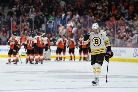 Boston Bruins right wing David Pastrnak (88) reacts after the game against the Philadelphia Flyers at Xfinity Mobile Arena.