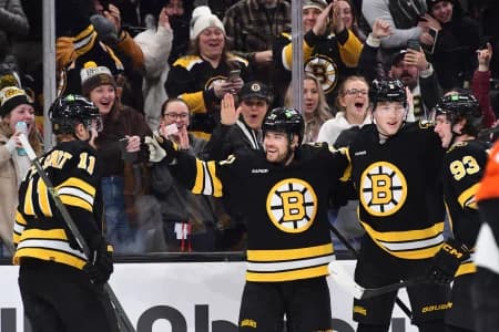 Boston Bruins left wing Viktor Arvidsson (71) celebrates his goal with his teammates during the first period against the Philadelphia Flyers at TD Garden.