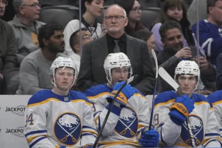 Buffalo Sabres head coach Lindy Ruff (center) during a break in the action against the Toronto Maple Leafs at Scotiabank Arena.