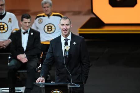 Former Boston Bruins Captain Zdeno Chara speaks at a ceremony to retire his number before a game between the Boston Bruins and the Seattle Kraken at TD Garden