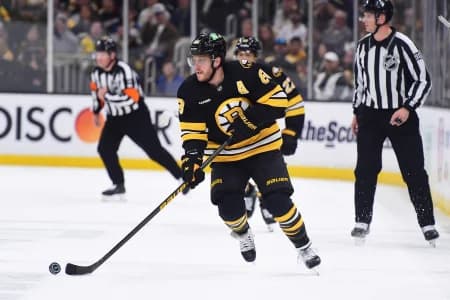 Boston Bruins right wing David Pastrnak (88) controls the puck during the first period in game four of the first round of the 2026 Stanley Cup Playoffs against the Buffalo Sabres at TD Garden.