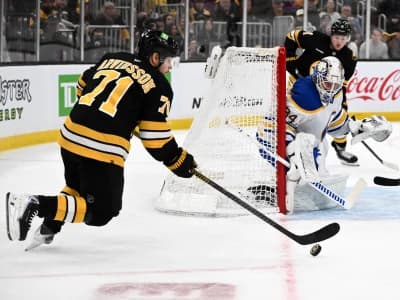 Boston Bruins left wing Viktor Arvidsson (71) attempts a shot on Buffalo Sabres goaltender Alex Lyon (34) during the first period of game three of the first round of the 2026 Stanley Cup Playoffs at the TD Garden.
