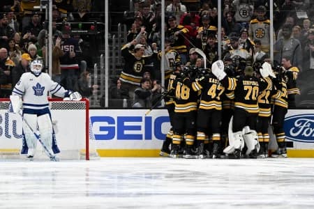 The Boston Bruins react after the right wing David Pastrnak (88) scored his 400th goal against the Toronto Maple Leafs during the second period at the TD Garden.