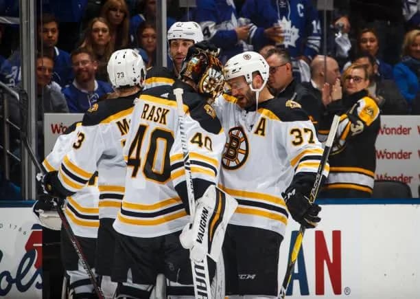 Boston Bruins players celebrating
