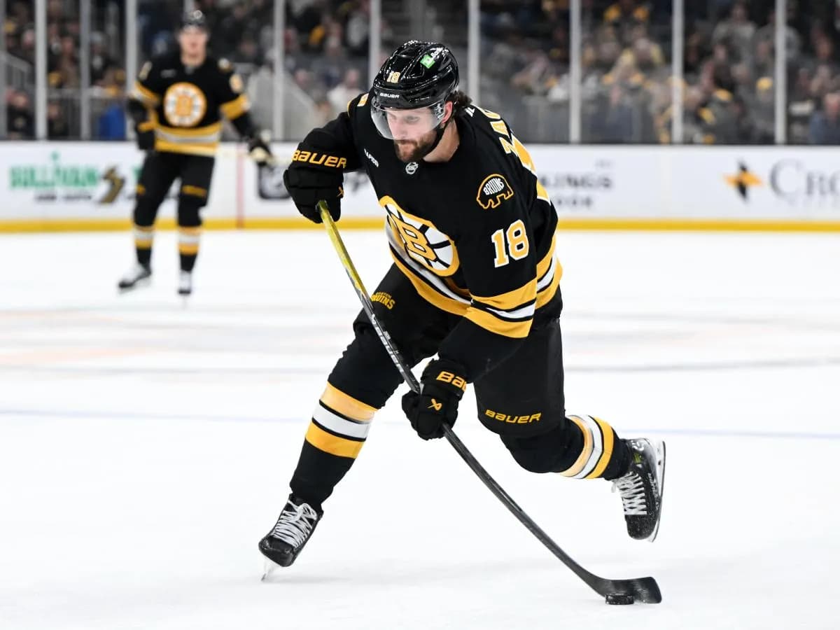 Boston Bruins center Pavel Zacha (18) takes a shot against the Ottawa Senators during the first period at the TD Garden.