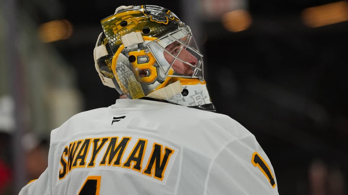 Boston Bruins goaltender Jeremy Swayman (1) looks on against the Carolina Hurricanes during the third period at Lenovo Center.