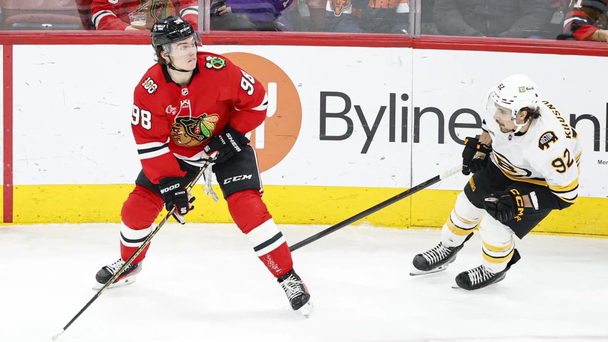 Boston Bruins center Marat Khusnutdinov (92) defends against Chicago Blackhawks center Connor Bedard (98) during the third period at United Center