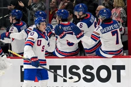 USA forward James Hagens (10) celebrates his goal against Slovakia during the second period of Group A play in the 2026 IIHF World Junior Championship at Grand Casino Arena.
