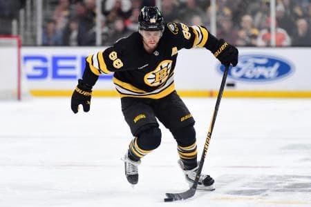 Boston Bruins right wing David Pastrnak (88) skates with the puck during the third period against the Philadelphia Flyers at TD Garden.