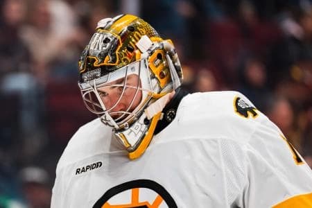 Boston Bruins goalie Jeremy Swayman (1) skates against the Vancouver Canucks in the second period at Rogers Arena.