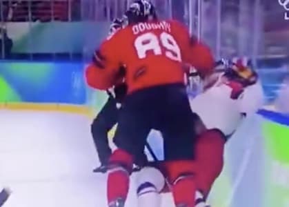 David Pastrnak takes heavy hit from Drew Doughty