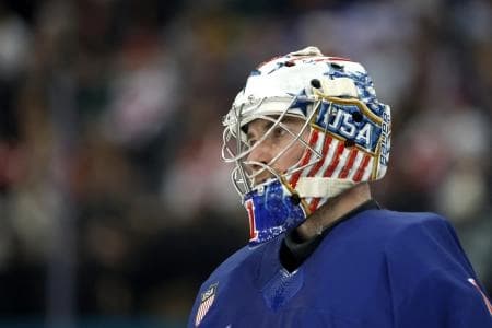 Jeremy Swayman of United States against Denmark in men's ice hockey group C play during the Milano Cortina 2026 Olympic Winter Games at Milano Santagiulia Ice Hockey Arena.