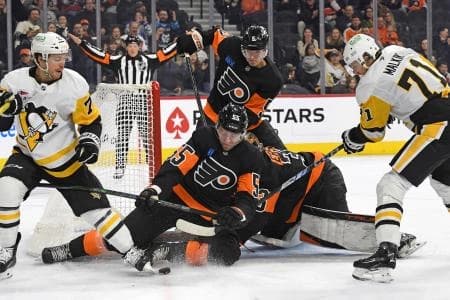 Philadelphia Flyers defenseman Rasmus Ristolainen (55) blocks short attempt by Pittsburgh Penguins center Evgeni Malkin (71) during the first period at Wells Fargo Center.