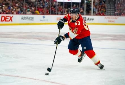 Florida Panthers left wing Brad Marchand (63) skates the puck against the Washington Capitals during the third period at Amerant Bank Arena.
