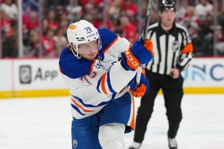 Edmonton Oilers defenseman Alec Regula (75) takes a shot against the Carolina Hurricanes during the second period at Lenovo Center