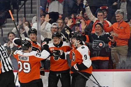Philadelphia Flyers right wing Owen Tippett (74) celebrates his goal with teammates against the Washington Capitals during the first period at Xfinity Mobile Arena.