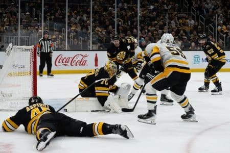 Boston Bruins goaltender Joonas Korpisalo (70) makes a save during the second period of the game against the Pittsburgh Penguins at TD Garden.