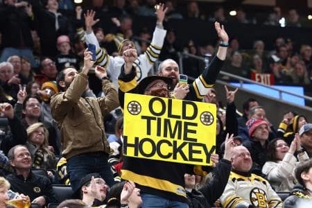 Boston Bruins fans cheer during the third period of their game against the Pittsburgh Penguins at TD Garden.