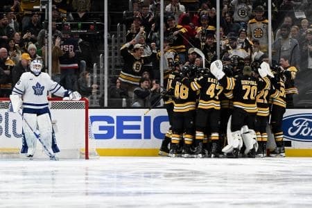 The Boston Bruins react after the right wing David Pastrnak (88) scored his 400th goal against the Toronto Maple Leafs during the second period at the TD Garden