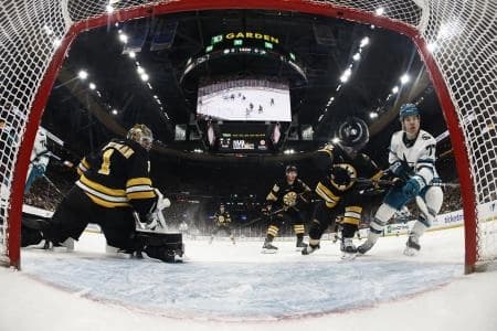 San Jose Sharks center Michael Misa (77) scores on Boston Bruins goaltender Jeremy Swayman (1) during the first period at TD Garden.