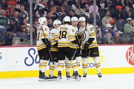 Boston Bruins defenseman Charlie McAvoy (73) celebrates with teammates after scoring a goal against the Philadelphia Flyers in the third period at Xfinity Mobile Arena.