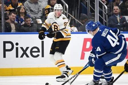 Boston Bruins forward Fraser Minten (93) pursues the play against the Toronto Maple Leafs in the second period at Scotiabank Arena.