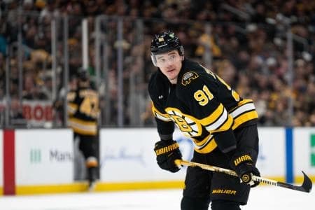 Boston Bruins defenseman Nikita Zadorov (91) prepares for a face-off during the second period of the game against the Pittsburgh Penguins at TD Garden.