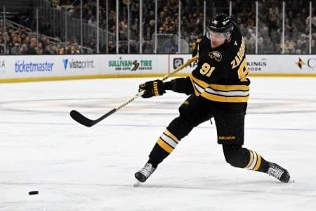 Boston Bruins defenseman Nikita Zadorov (91) attempts a shot against the Vegas Golden Knights during the third period at the TD Garden.