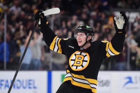 Boston Bruins center Fraser Minten (93) reacts after defeating the Los Angeles Kings in overtime at TD Garden. Mandatory