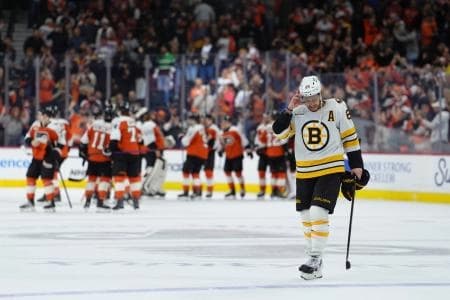 Boston Bruins right wing David Pastrnak (88) reacts after the game against the Philadelphia Flyers at Xfinity Mobile Arena.