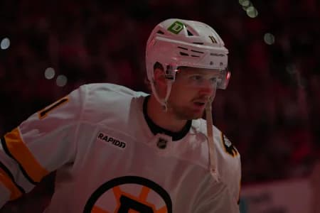 Boston Bruins center Casey Mittelstadt (11) skates before the start of the game against the Carolina Hurricanes at Lenovo Center.