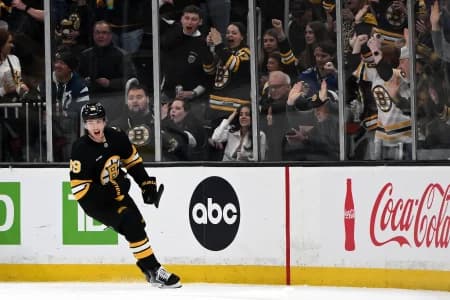 Boston Bruins center Morgan Geekie (39) reacts after scoring a goal against the Tampa Bay Lightning during the second period at the TD Garden.