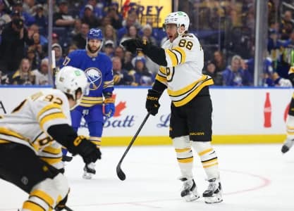 Boston Bruins right wing David Pastrnak (88) reacts after scoring a goal during the first period against the Buffalo Sabres at KeyBank Center.