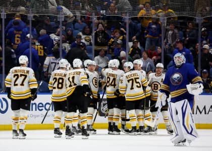 The Boston Bruins celebrate a win over the Buffalo Sabres at KeyBank Center.