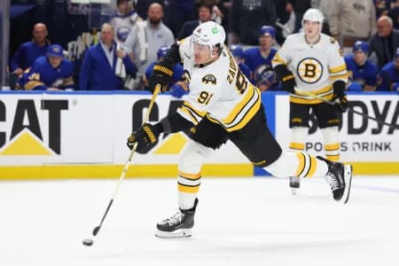 Boston Bruins defenseman Nikita Zadorov (91) takes a shot on goal during the third period against the Buffalo Sabres in game one of the first round of the 2026 Stanley Cup Playoffs at KeyBank Center.