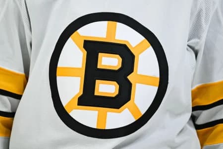 View of a Boston Bruins logo on a jersey worn by a member of the team during the second period at Bell Centre