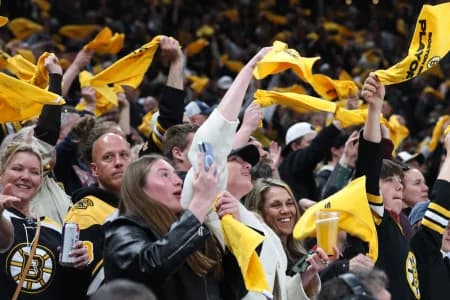 Boston Bruins fans cheer after right wing David Pastrnak (88) scored against the Buffalo Sabres during the second period of game six of the first round of the 2026 Stanley Cup Playoffs at TD Garden.