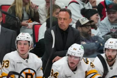 Boston Bruins head coach Marco Sturm looks on from behind the players bench against the Carolina Hurricanes during the second period at Lenovo Center.