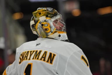 Boston Bruins goaltender Jeremy Swayman (1) looks on against the Carolina Hurricanes during the third period at Lenovo Center.